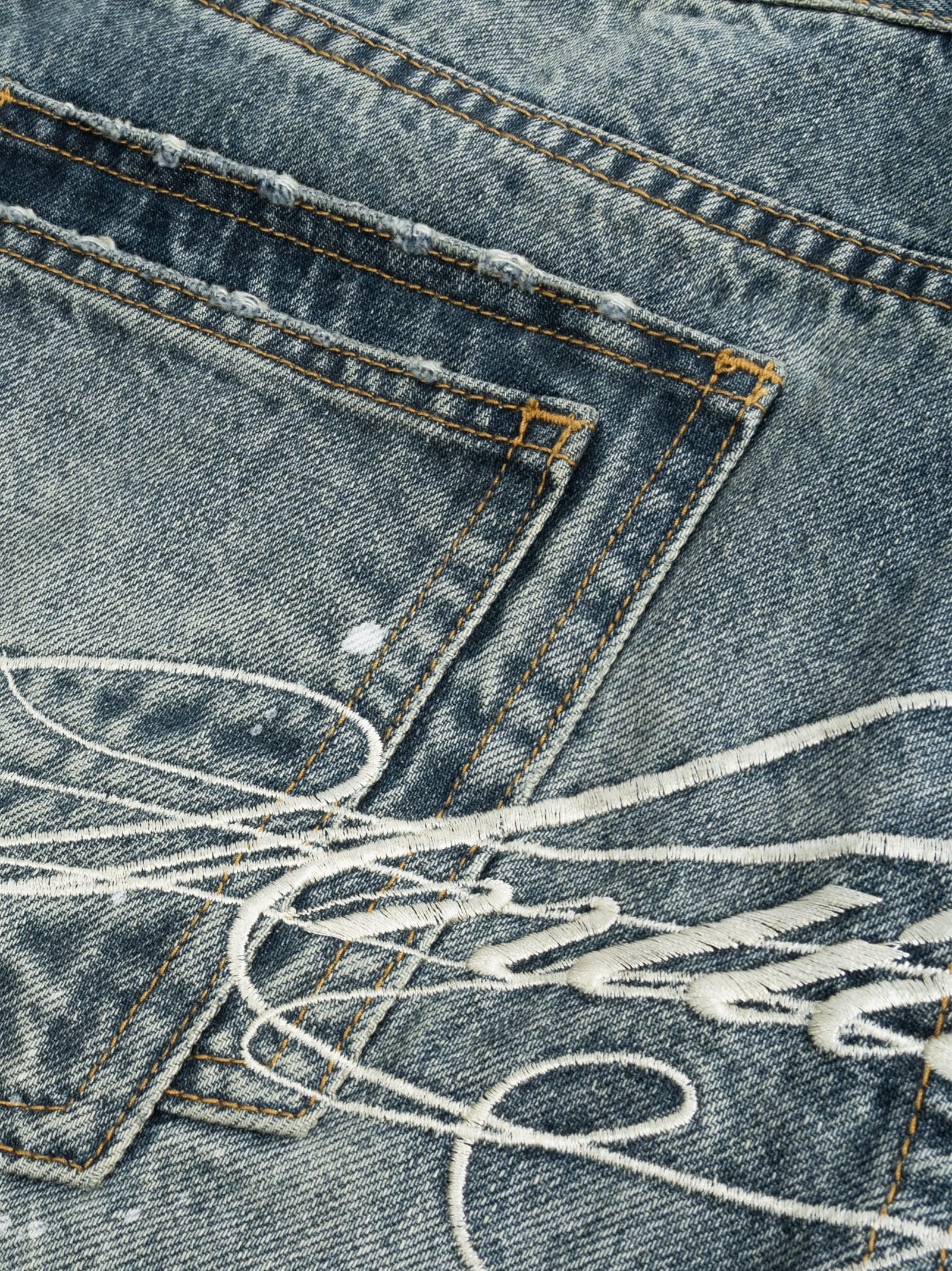 Embroidered Distressed Washed Jeans